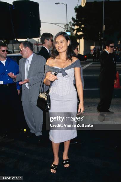 Tia Carrere attends the 'Men in Black' Hollywood Premiere held at Pacific's Cinerama Dome in Hollywood, California, United States, 25th June 1997.