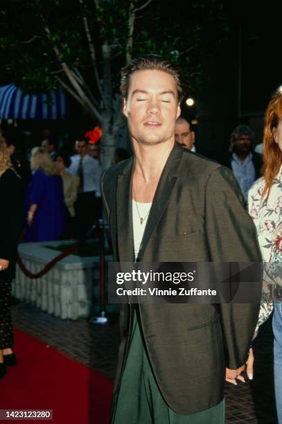 Actor BoJesse Christopher attends the 'Hot Shots!' Westwood Premiere at Avco Center Cinemas in Westwood, California, United States, 26th July 1991.