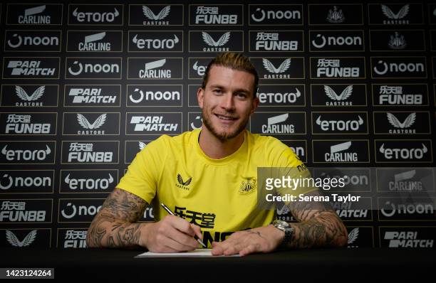 Loris Karius poses for photographs after signing for Newcastle United at the Newcastle Training Centre on September 08, 2022 in Newcastle upon Tyne,...