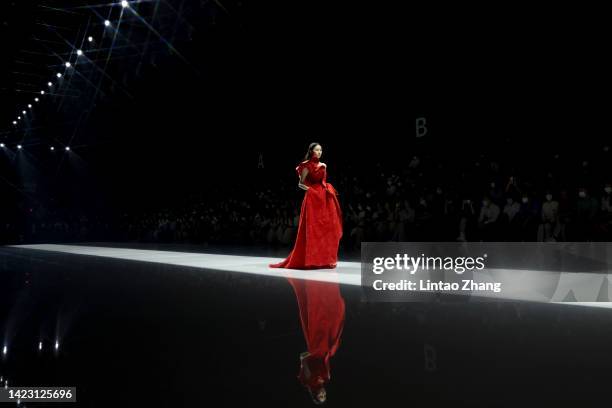 Model showcase design on the runway at La Koradior collection show by Chinese designer Hu Lifen during the China Fashion Week 2023 S/S Collection at...