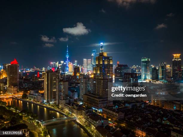 aerial view of shanghai lujizui financial district at night - shanghai night stock-fotos und bilder