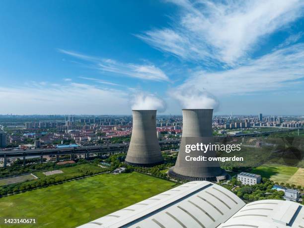 aerial view of thermal power generation - cooling tower stock pictures, royalty-free photos & images
