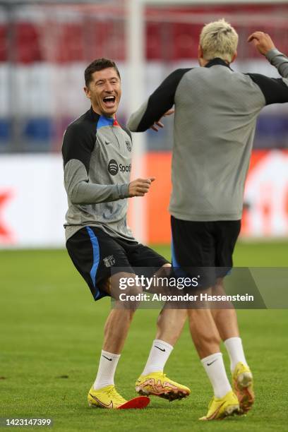 Robert Lewandowski of FC Barcelona reacts during a FC Barcelona training session ahead of their UEFA Champions League group C match against FC Bayern...