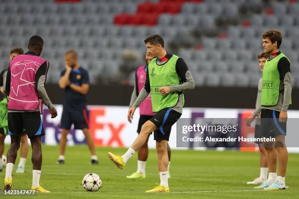 Robert Lewandowski of FC Barcelona plays the ball during a FC Barcelona training session ahead of their UEFA Champions League group C match against...