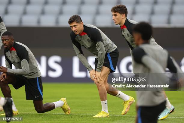 Robert Lewandowski of FC Barcelona looks on during a FC Barcelona training session ahead of their UEFA Champions League group C match against FC...