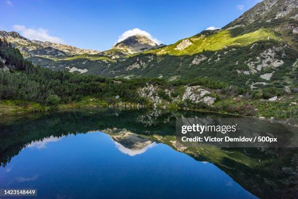 scenic view of lake and mountains against clear blue sky,pirin national park,bulgaria - pirin mountains stock pictures, royalty-free photos & images