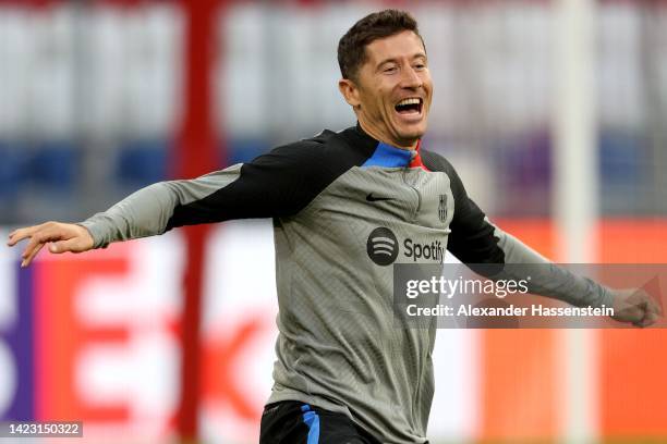 Robert Lewandowski of FC Barcelona reacts during a FC Barcelona training session ahead of their UEFA Champions League group C match against FC Bayern...