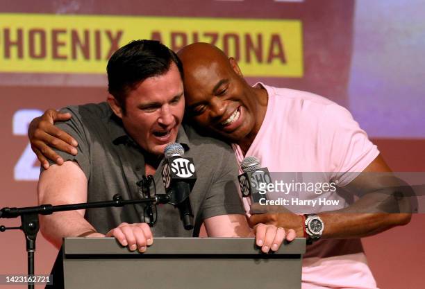 Chael Sonnen receives a hug from Anderson Silva during a Jake Paul v Anderson Silva press conference at NeueHouse Hollywood on September 12, 2022 in...