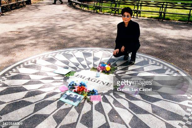Yoko Ono poses in Central Park at the Imagine Memorial in Honor of John Lennon on April 20, 2000 in New York City. John Lennon was shot and Killed by...