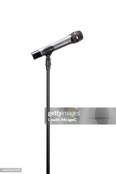 dynamic microphone on stand isolated on white - microfoonstandaard stockfoto's en -beelden