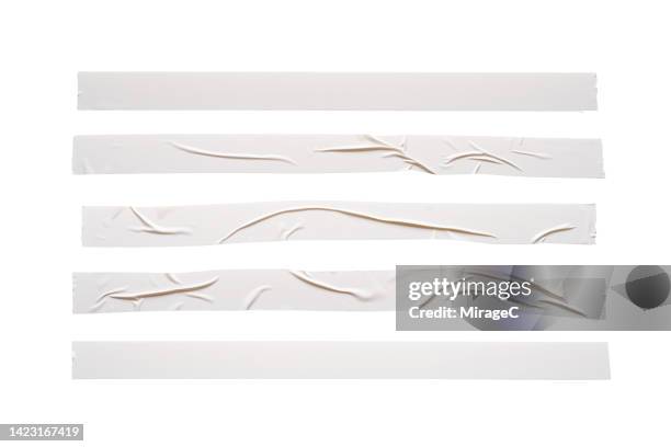 white duct tape long strips isolated on white - fita cola imagens e fotografias de stock