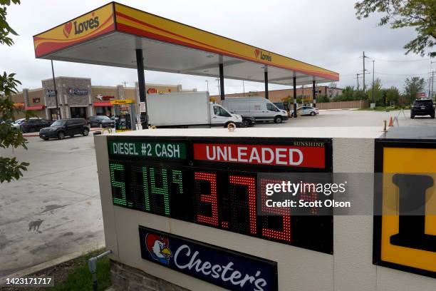 Gas prices are displayed at a Loves gas station on September 12, 2022 in Bensenville, Illinois. According to a survey from the New York Federal...