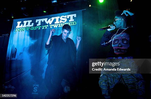 Singer Justin Bieber and rapper Lil Twist open for TYGA at Club Nokia on April 1, 2012 in Los Angeles, California.