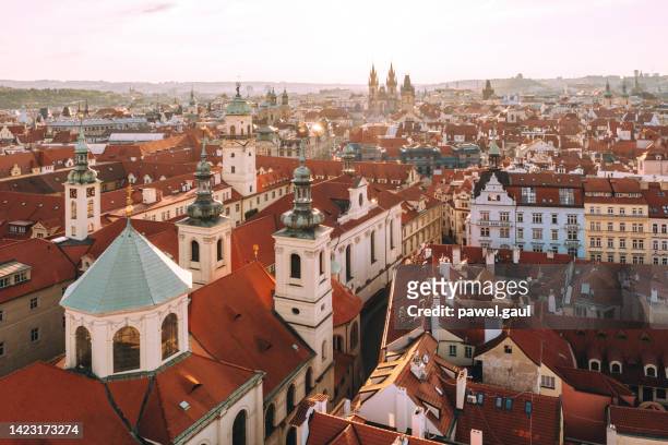 aerial view of prague old town during sunrise in czech republic - prague stock pictures, royalty-free photos & images