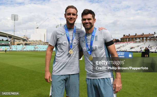 Stuart Broad and James Anderson pose with their medals after England won the third Test and the series against South Africa at The Kia Oval on...