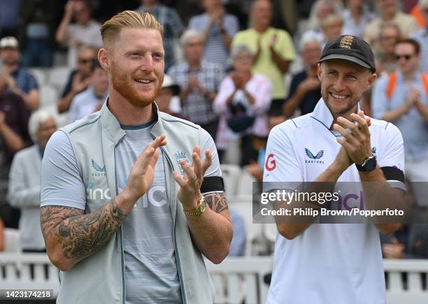 Ben Stokes and Joe Root applaud after England won the third Test and the series against South Africa at The Kia Oval on September 12, 2022 in London,...