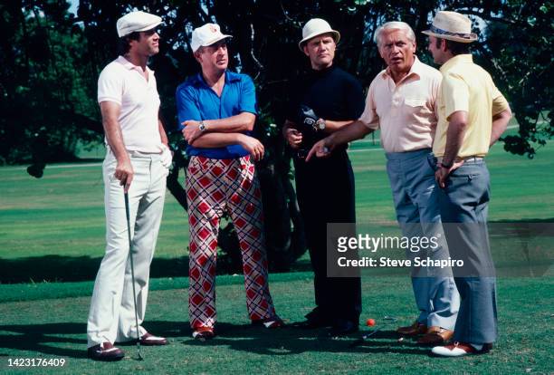 From left, American actors Chevy Chase , Rodney Dangerfield , Dan Resin , Ted Knight , and Brian Doyle-Murray in a scene from the film in...