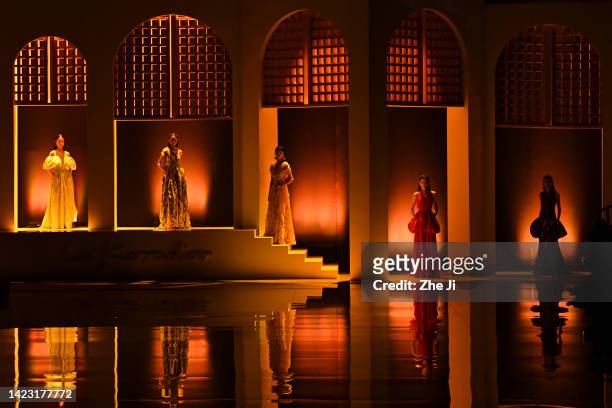 Models showcase design on the runway at La Koradior collection show by Chinese designer Hu Lifen during the China Fashion Week 2023 S/S Collection at...