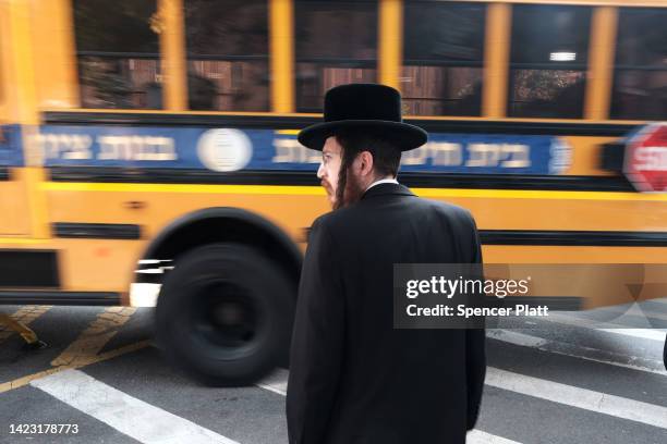 Yeshiva school bus drives through Borough Park on September 12, 2022 in the Brooklyn borough of New York City. Following recent reports and test...