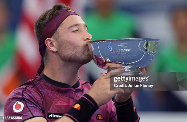 Alfie Hewett of Great Britain kisses the trophy after his win over Shingo Kunieda of Japan during their Men’s Wheelchair Singles Final match during...
