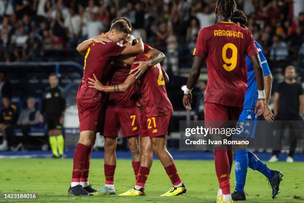 Paulo Dybala of AS Roma celebrates with team mates after scoring a goal to make it 0-1 during the Serie A match between Empoli FC and AS Roma at...