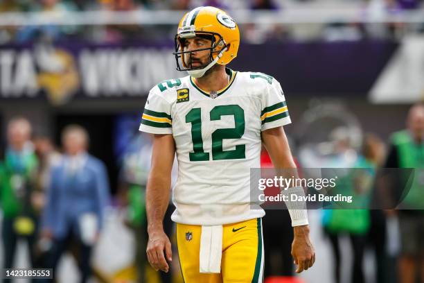 Aaron Rodgers of the Green Bay Packers on the field against the Minnesota Vikings quarter of the game at U.S. Bank Stadium on September 11, 2022 in...