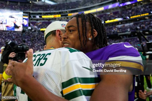 Aaron Rodgers of the Green Bay Packers and Justin Jefferson of the Minnesota Vikings embrace after the game at U.S. Bank Stadium on September 11,...