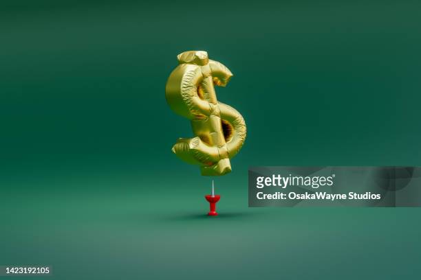 inflated dollar - deflación economía fotografías e imágenes de stock