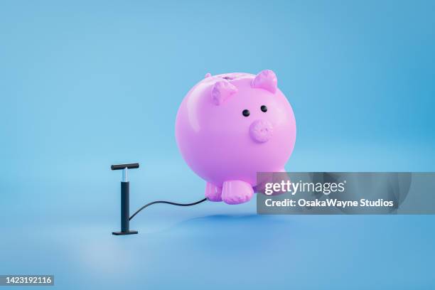 inflation piggy bank - air pump stock pictures, royalty-free photos & images