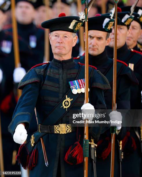 Members of The Royal Company of Archers, the Sovereign's Body Guard in Scotland, walk along The Royal Mile to St Giles' Cathedral for a Service of...