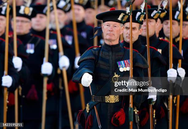 Members of The Royal Company of Archers, the Sovereign's Body Guard in Scotland, walk along The Royal Mile to St Giles' Cathedral for a Service of...