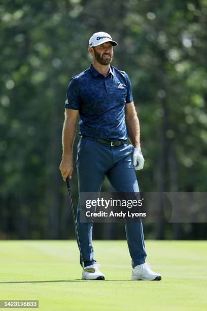 Dustin Johnson of the the United States hits his tee shot on the 16th hole during the final round of the LIV Golf Invitational - Boston at The Oaks...