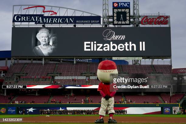Message in honor of the late Queen Elizabeth II of Great Britain is displayed on the scoreboard before the game between the Pittsburgh Pirates and...