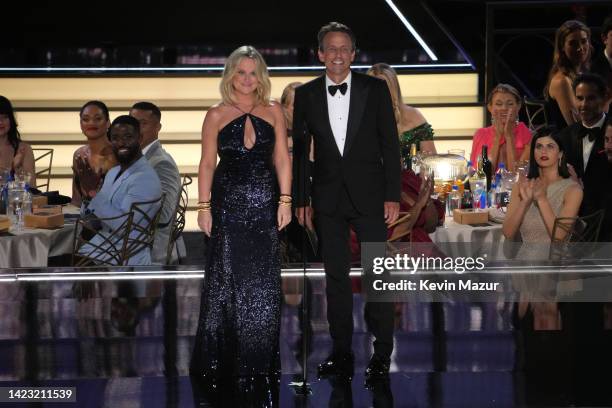 Amy Poehler and Seth Meyers speak onstage during the 74th Primetime Emmys at Microsoft Theater on September 12, 2022 in Los Angeles, California.