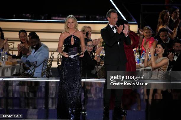 Amy Poehler and Seth Meyers speak onstage during the 74th Primetime Emmys at Microsoft Theater on September 12, 2022 in Los Angeles, California.