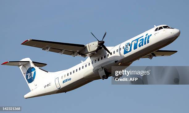 Picture taken on September 10 shows a French-Italian made ATR-72 passenger plane of private Russian airline UTair, board number VP-BYZ, taking off in...
