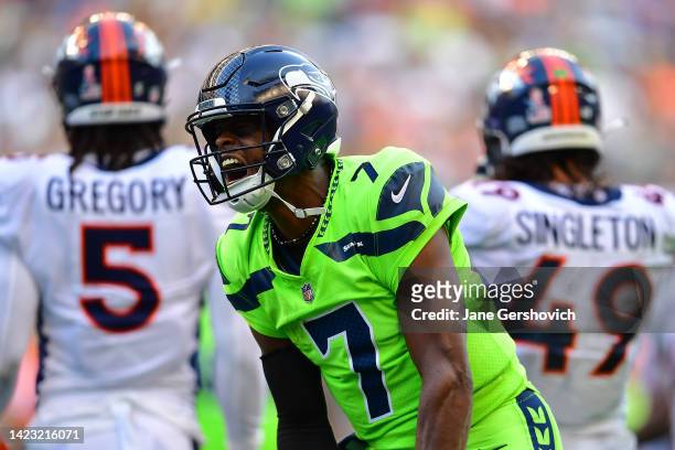 Geno Smith of the Seattle Seahawks celebrates during the second quarter against the Denver Broncos at Lumen Field on September 12, 2022 in Seattle,...