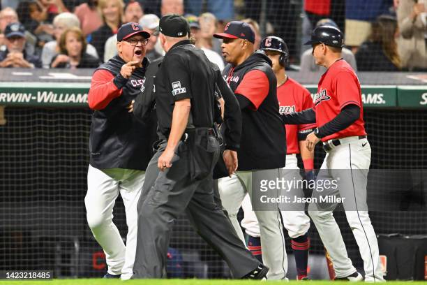 Terry Francona of the Cleveland Guardians argues with home plate umpire Ron Kulpa after being ejected in the eighth inning against the Los Angeles...
