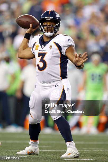 Russell Wilson of the Denver Broncos passes during the fourth quarter at Lumen Field on September 12, 2022 in Seattle, Washington.