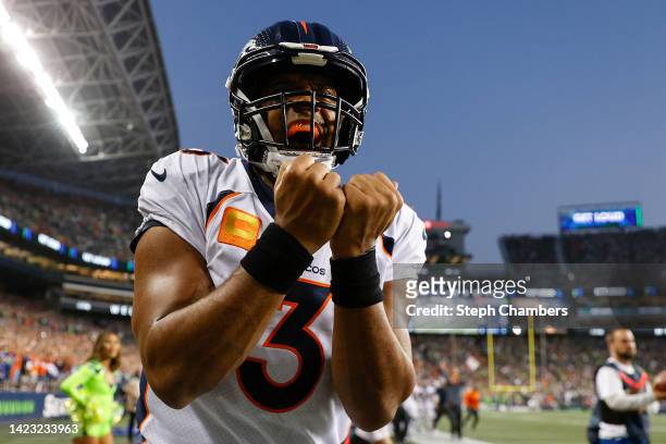 Russell Wilson of the Denver Broncos reacts during the fourth quarter against the Seattle Seahawks at Lumen Field on September 12, 2022 in Seattle,...