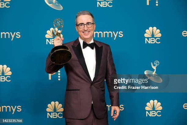 John Oliver, winner of the Outstanding Variety Talk Series award for 'Last Week Tonight with John Oliver', poses in the press room during the 74th...