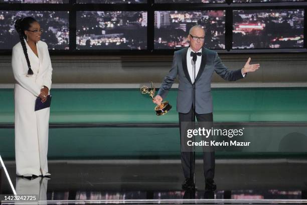 Michael Keaton accepts the Outstanding Lead Actor in a Limited or Anthology Series or Movie award for 'Dopesick' onstage from Oprah Winfrey during...