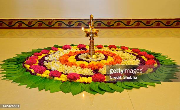 onam celebrations at home - rangoli stock pictures, royalty-free photos & images
