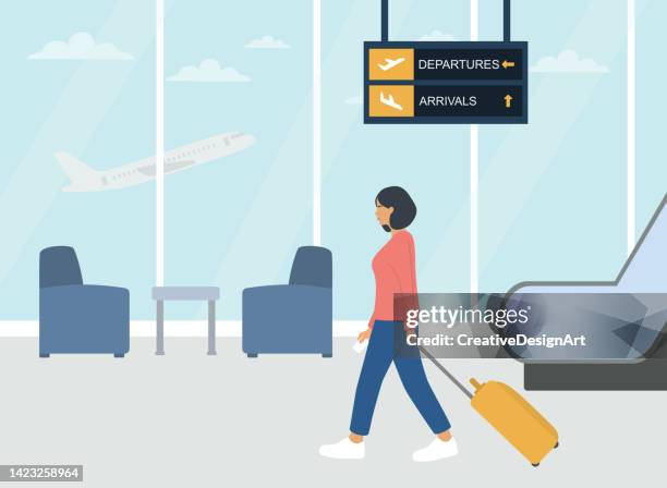 stockillustraties, clipart, cartoons en iconen met young woman walking with suitcase at airport - inkomhal