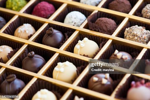 chocolates - candy box stock pictures, royalty-free photos & images