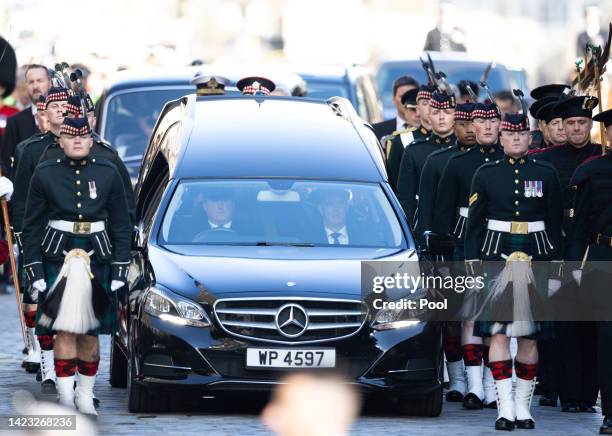 Hearse carrying the coffin of Queen Elizabeth II arries St Giles Cathedral, after making its way along The Royal Mile on September 12, 2022 in...
