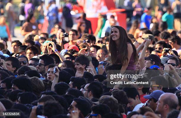 Fans participate in the Lollapalooza music festival at O Higgins Park on April 1, 2012 in Santiago, Chile.