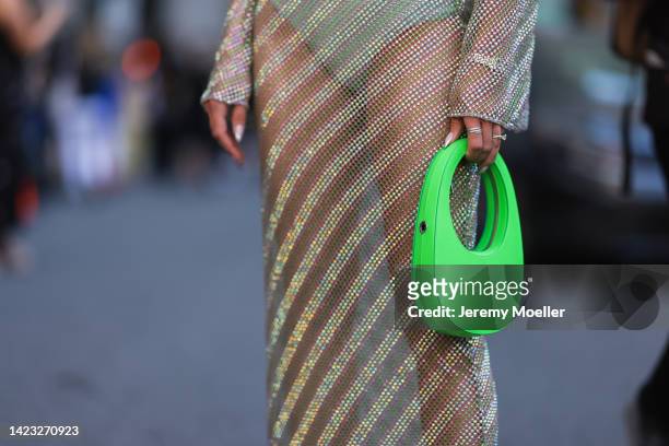 Thassia Naves seen wearing a glittery dress with a coperni bag, outside PatBo Show during New York Fashion Week on September 10, 2022 in New York...