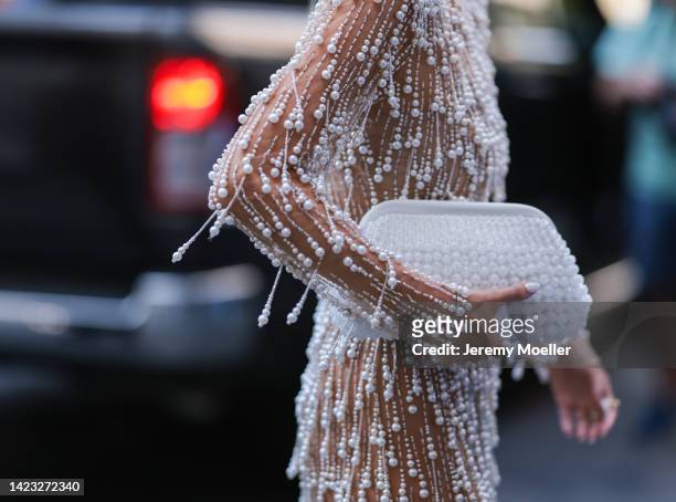 Leonie Hanne seen wearing a glitter dress with Balenciaga shades and shoes, outside PatBo Show during New York Fashion Week on September 10, 2022 in...