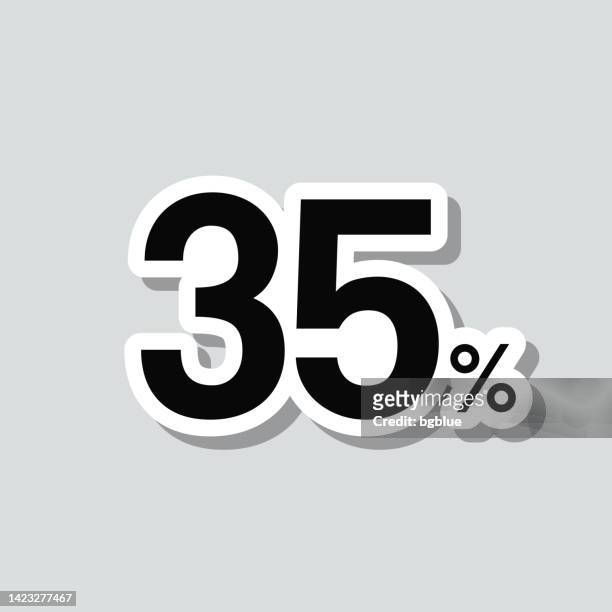 35% - fünfunddreißig prozent. symbolaufkleber auf grauem hintergrund - zahl 35 stock-grafiken, -clipart, -cartoons und -symbole